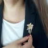 Gold crystal brooch: flower with small diamond