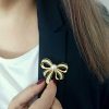 Gold or silver crystal brooch