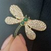 Gold crystal brooch: dragonfly with green stones