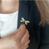 Gold crystal brooch: dragonfly with green stones