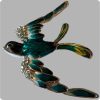 Crystal brooch: swallow in dark blue color