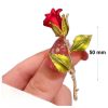 Gold brooch: Red rose