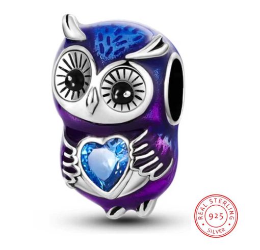 Owl with blue stone