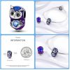 Owl with blue stone