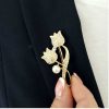 Two tulips with a pearl