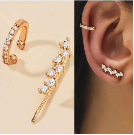 Set of two gold crystal earrings.