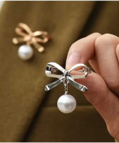 Silver brooch bow pearl