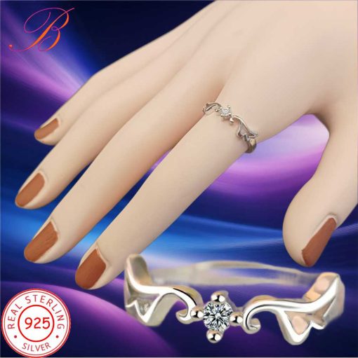 Silver ring with white zircon