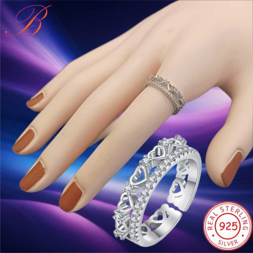 Silver crystal ring with hearts.