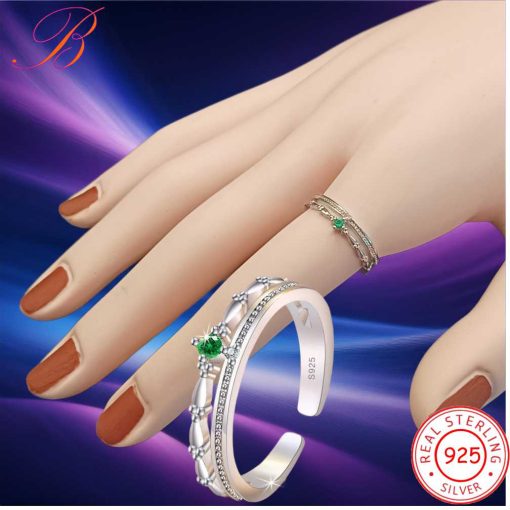 Silver crystal ring with green zircon
