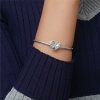 silver heart-shaped ring pendant