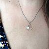 Crystal heart pendant with butterfly