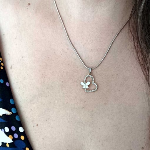 Crystal heart pendant with butterfly