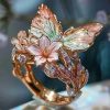 Rose gold Max ring: Flower and butterfly