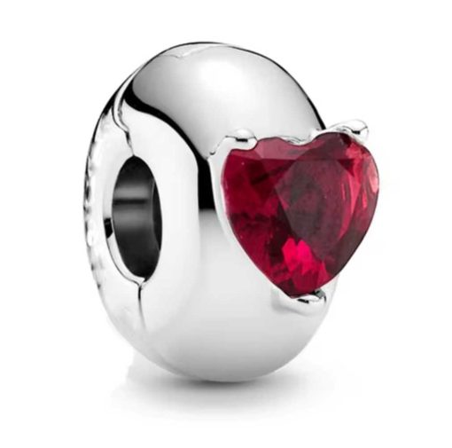 silver ring with red zircon