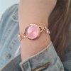 Gold light pink wristwatch