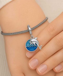 Pendant: Dolphin and blue background.